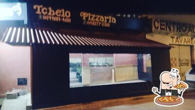 No Tchelos pizzaria, você pode desfrutar de pizza