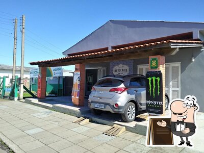 Você pode espairecer no na área externa do Mercearia Dom João