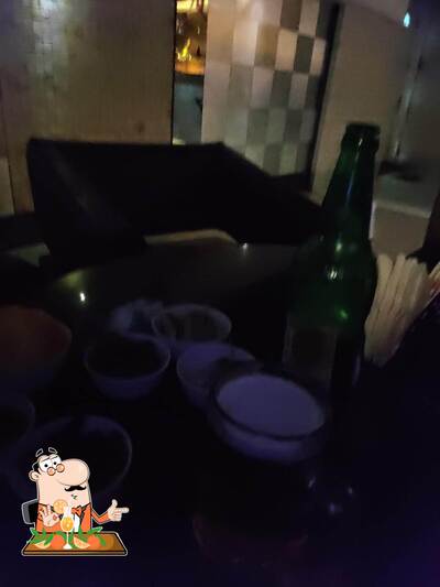 Order an alcoholic drink from the menu