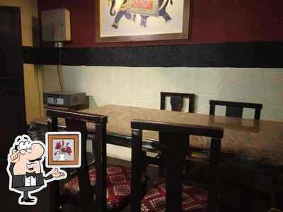 Take a seat at one of the tables at Pisharody's