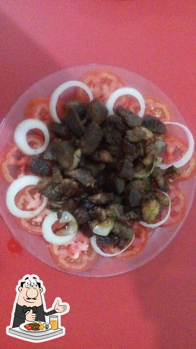 Comida em Point do hambúrguer em caf