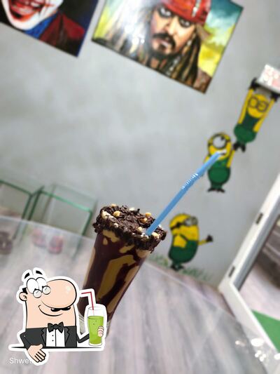 Enjoy a beverage at 7 Themes Cafe