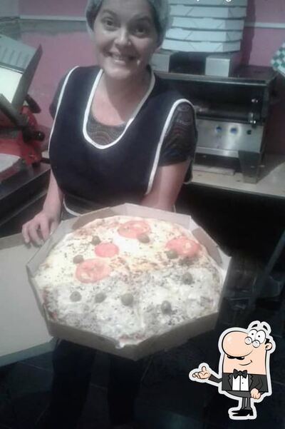 O interior do L&M Pizza e Lanches