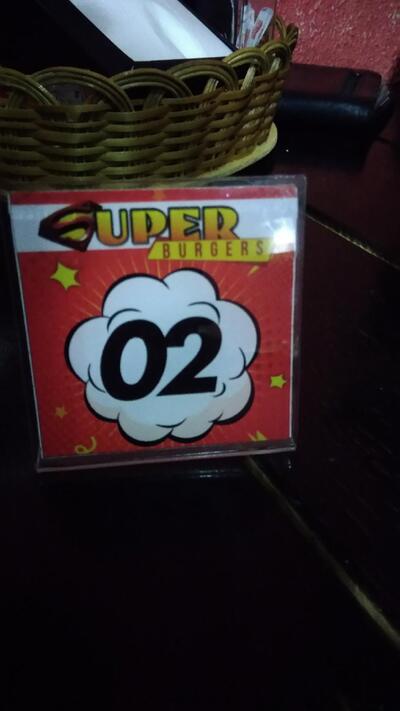 O logotipo do Super Burgers Vila