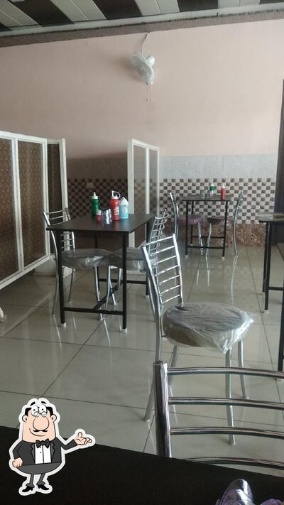 Take a seat at one of the tables at AUJLA Food Point