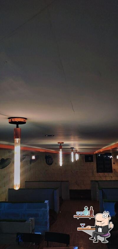 Take a seat at one of the tables at Bismillah -A House Of Biryanis & Kebabs