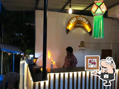 Take a seat at one of the tables at FOOD CORNER ( MANA NELLORE RUCHULU )