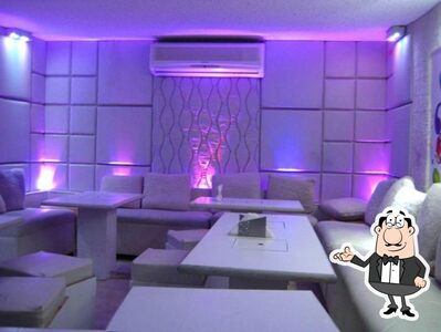 Take a seat at one of the tables at Waterpipe
