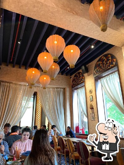 Take a seat at one of the tables at Bayroute