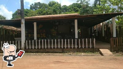 Você pode espairecer no na área externa do Pizzaria Trindade