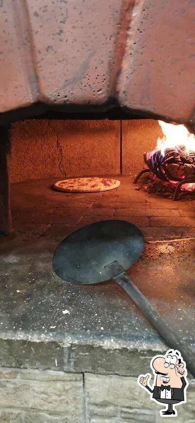 Dai un'occhiata agli interni di Trattoria Pizzeria Rejal