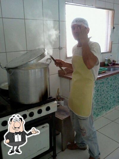 Sente em uma das mesas no O Rei da Pamonha - Alta floresta MT