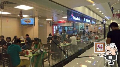 Check out how Domino's Pizza, Forum Rangoli Mall, Belur looks inside