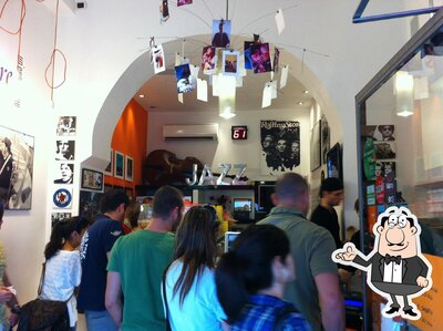 Take a seat at one of the tables at La Gelateria della Musica