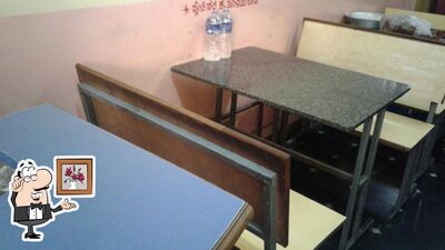 Take a seat at one of the tables at Madhu Pack 'n' Take