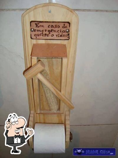 Sente em uma das mesas no Restaurante E Lancheria Da Mata