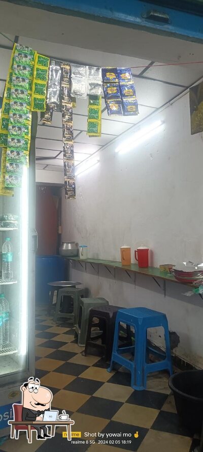 Take a seat at one of the tables at ranjith fast food