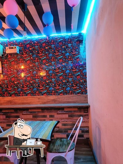 Take a seat at one of the tables at Mom's Cafe and Restaurant