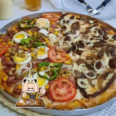 No Pizzaria Delícia do cheff, você pode degustar pizza