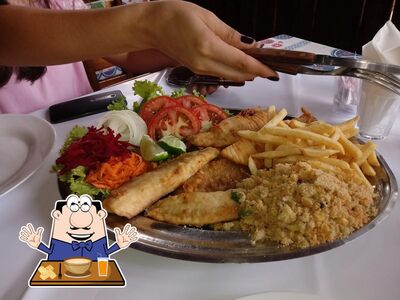 Comida em Restaurante Fundo de Quintal