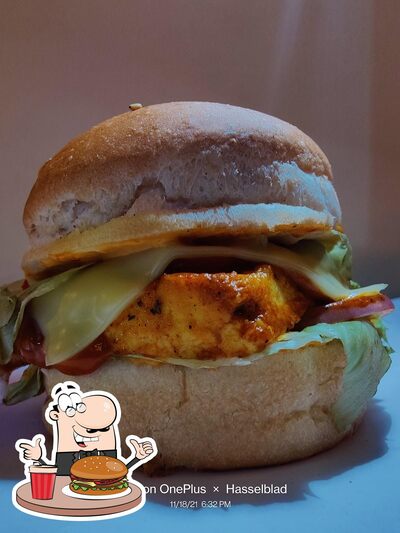 Get a burger at Cafe Amit's Kitchen ,Rahuri