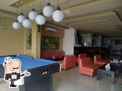 Take a seat at one of the tables at Fitto's Cafe