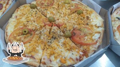 No Ky Dogão Do Barão, você pode desfrutar de pizza