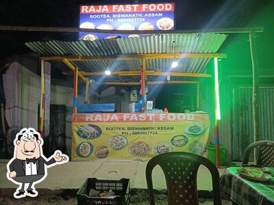 Take a seat at one of the tables at RAJA FASTFOOD