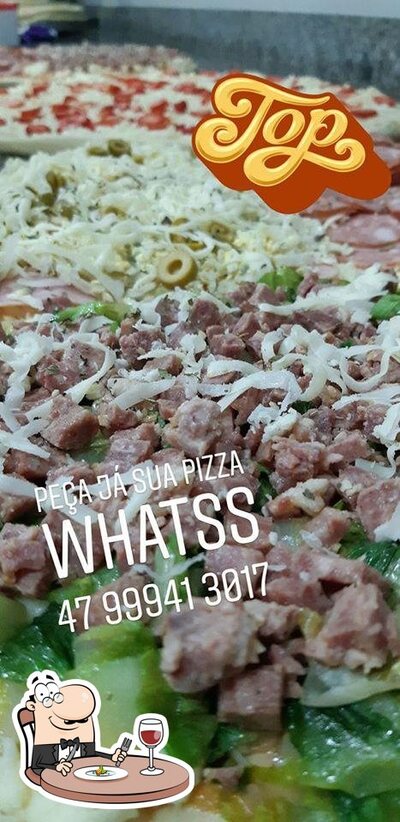 Comida em Super Pizza Gigante De Porto Belo