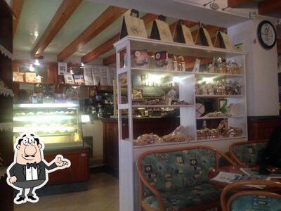 Siediti a un tavolo di Pasticceria Cortese
