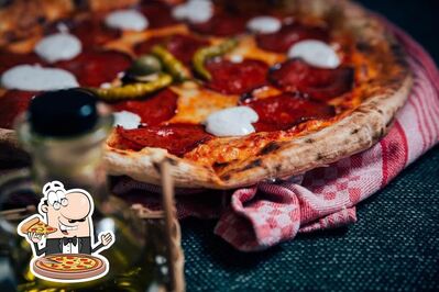 Prenditi una pizza alla pizzeria Pizza Buldog