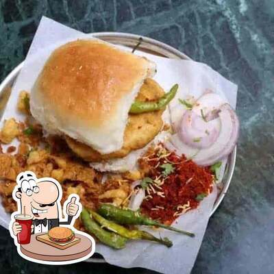 Try out a burger at S Kumar Wadewale