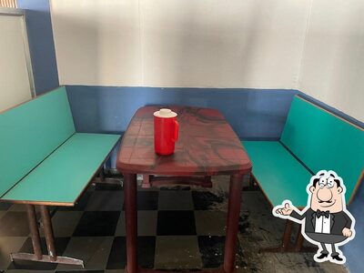 Take a seat at one of the tables at Kanthara Family Restaurant