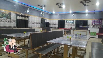 Take a seat at one of the tables at HOTEL SAHARA