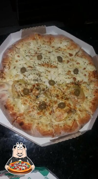 No Pizzaria bella pizza, você pode desfrutar de pizza