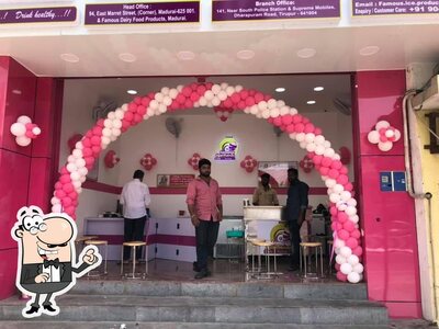Take a seat at one of the tables at Madurai Famous Jigarthanda LLP - Since 1977