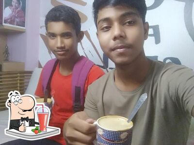 Enjoy a beverage at Adda cafe