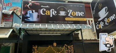 The advertisement displays information about Cafe zone