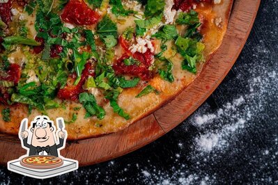 No Capital Pizzaria Sudoeste, você pode degustar pizza