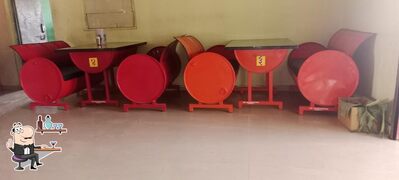 Take a seat at one of the tables at Hotel Dosti Restaurant & Bar