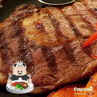 Pratos de carne são servidos no Capone Restaurante E Bar