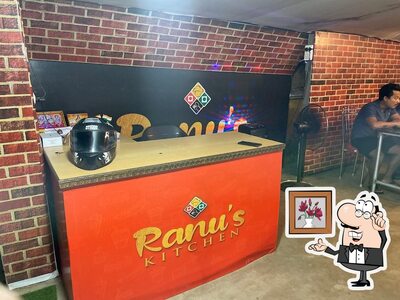 Take a seat at one of the tables at Ranu's Kitchen