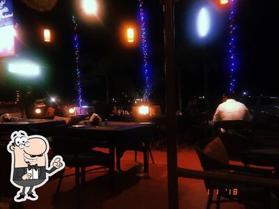 Take a seat at one of the tables at Coyote