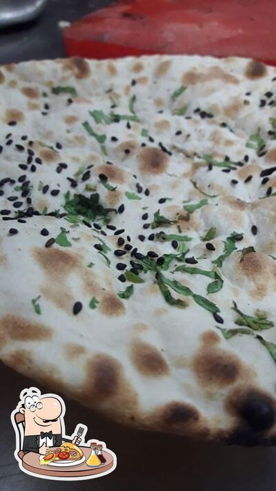 Try out pizza at Tasty M Restaurant