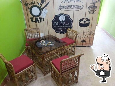 Take a seat at one of the tables at Spicy Bites
