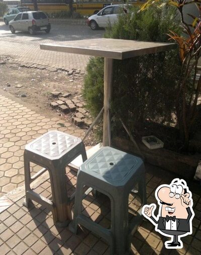 Take a seat at one of the tables at Mahendras Kitchen