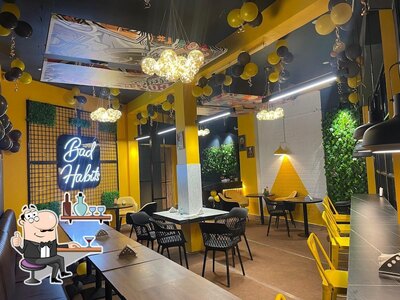 Take a seat at one of the tables at High Bros Cafe
