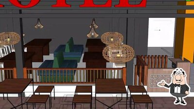 Take a seat at one of the tables at Malabar Fast Food