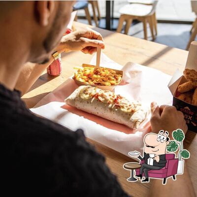 Installez-vous à l'une des tables de O'TACOS SAINT-LÔ