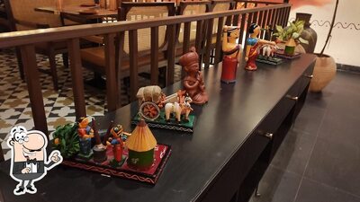 Take a seat at one of the tables at Krishnapatnam